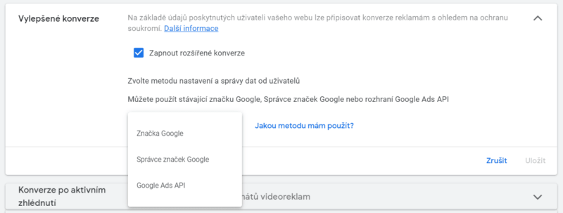 A dialog box with various options in Czech features a checkbox at the top labeled "Zapnout rozšířené konverze," reflecting account-level enhancements. A dropdown menu displays choices: "Značka Google," "Správce značek Google," and "Google Ads API.
