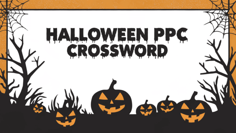 The Halloween-themed image showcases the eerie text "Halloween PPC Crossword" in a spooky font. The border is adorned with cobwebs and silhouettes of leafless trees, while grinning jack-o'-lanterns lurk at the bottom. An orange and white gradient sets a mysterious background tone.