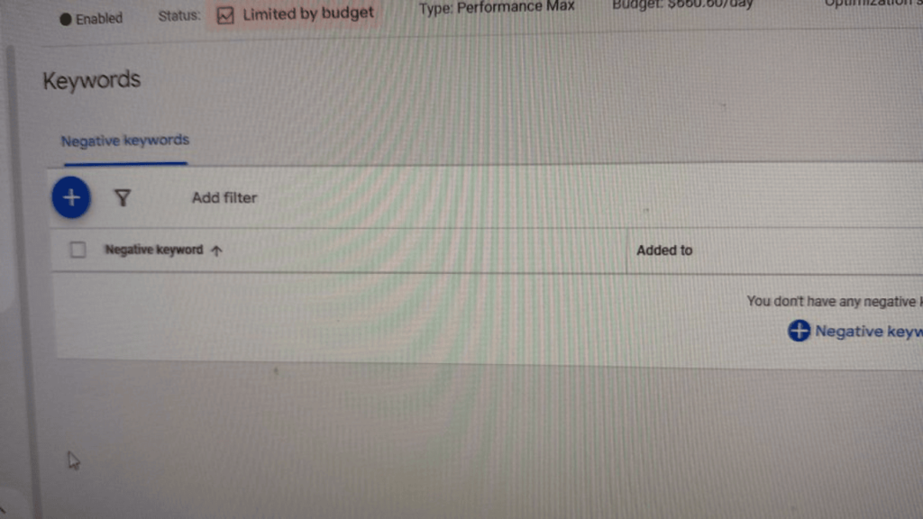 A screenshot of a keyword management section in Google Ads. The screen features an area to add negative keywords for optimizing Performance Max campaigns.