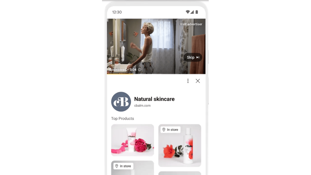 A smartphone screen displays a retail video ad featuring a person in a bathroom. Below, the "Natural Skincare" brand advert showcases images of skincare products, including bottles and flowers, highlighting local availability for eager shoppers.