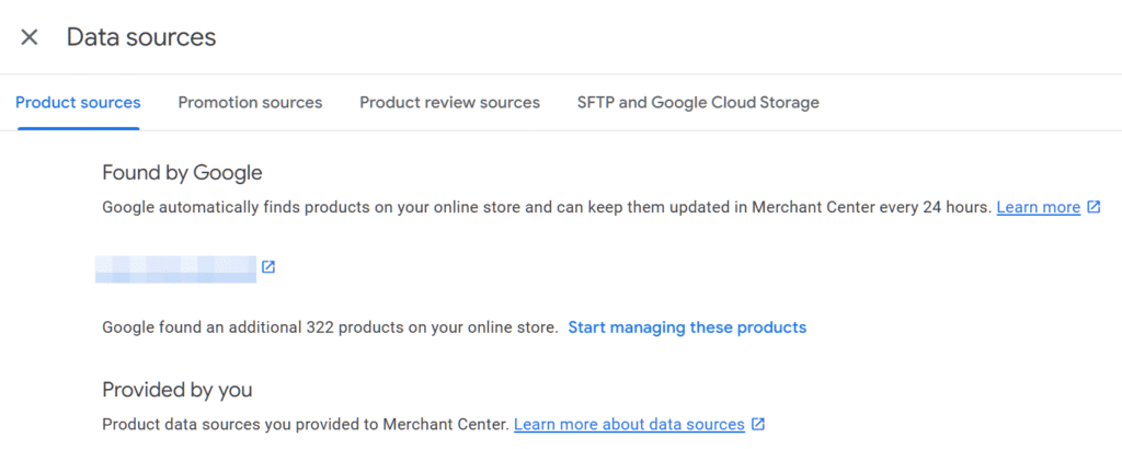 Screenshot of the "Data sources" page in Google Merchant Center showing "Product sources." Google has auto-discovered 322 products, with options to manage these or learn more. Tabs for other data sources are visible at the top.