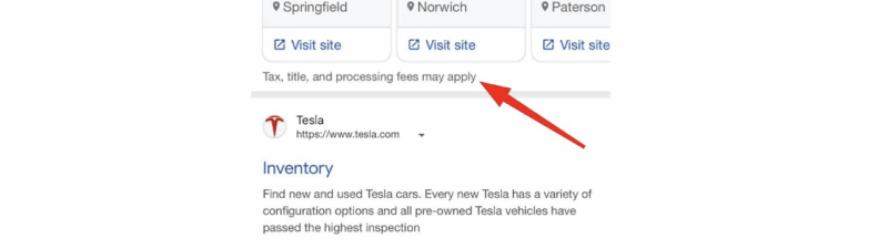 Screenshot showing used car listings with prices, mileage, and locations. A red arrow highlights a disclaimer below the listings that reads, "Tax, title, and processing fees may apply.