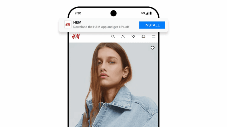 A smartphone screen displays the H&M app with a woman in a denim jacket. A banner at the top promotes downloading the H&M app for 15% off, featuring an "INSTALL" button and a deep link for seamless access.