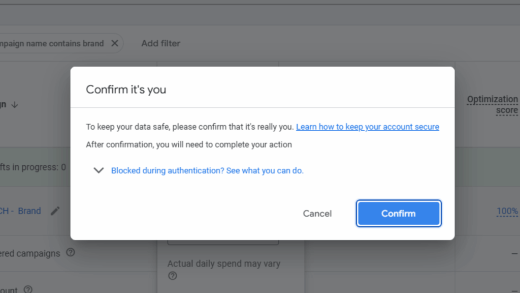 A pop-up window displays a security prompt titled "Confirm it's you," asking for User Verification to keep data safe, with options to cancel or confirm and a help link for authentication issues.