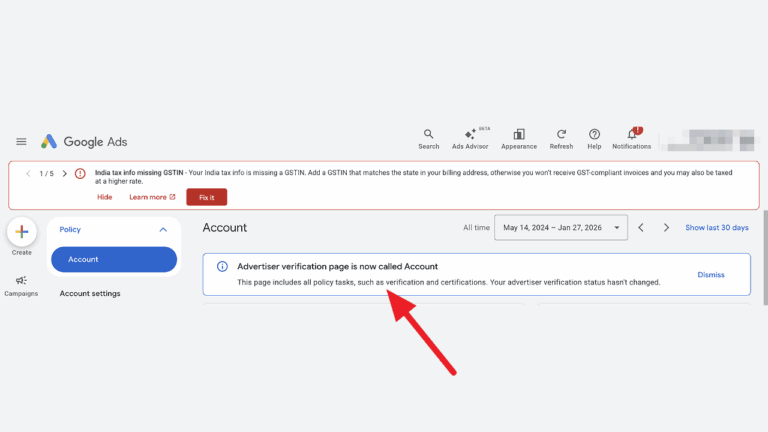 A Google Ads dashboard displays an alert about a missing GSTIN and a message stating "Advertiser verification page is now called Account," with a red arrow highlighting the message box under Advertiser Verification settings.