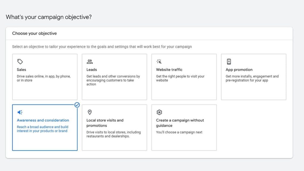 A campaign objective selection screen in Google Ads with six options: Sales, Leads, Website traffic, App promotion, Awareness and consideration (highlighted), Local store visits and promotions, and Create a campaign without guidance.