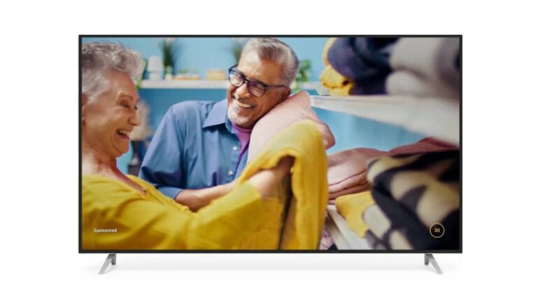 A TV screen displays an older couple laughing together while folding laundry in a bright, colorful room with shelves of towels, as a YouTube CTV VRC Non-Skippable Ad plays in the background.