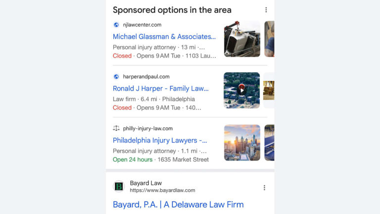 A smartphone screen shows a Google search listing sponsored law firms nearby, including Michael Glassman & Associates, Ronald J Harper - Family Law, Philadelphia Injury Lawyers, and Bayard Law.