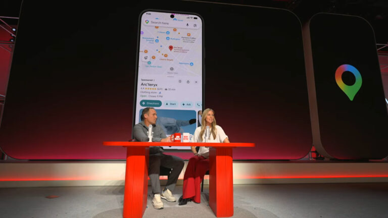 Two presenters sit at a red table beneath a large display screen showing Google Maps with a local business listing for Arc'teryx, demonstrating Google's new demand ads expansion to the Maps platform.
