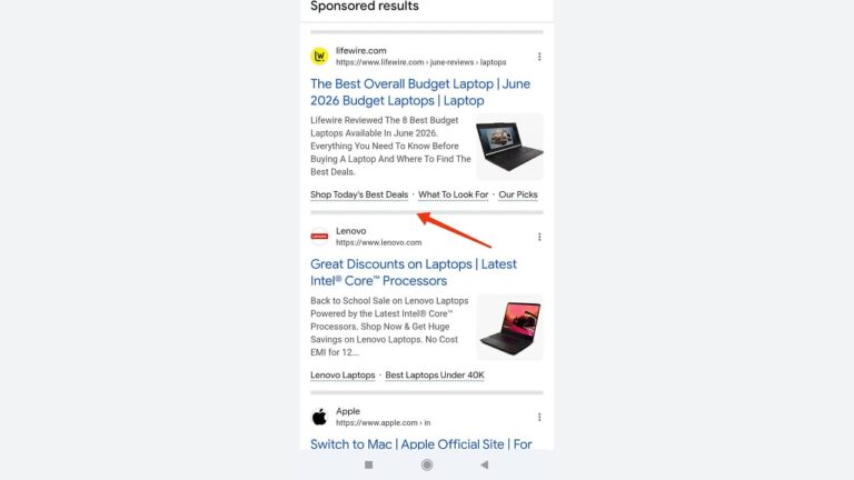 A screenshot of Google search results for budget laptops, showing links to Lifewire, Lenovo, and Apple, with an arrow pointing to the “What To Look For” link in the Lenovo section.