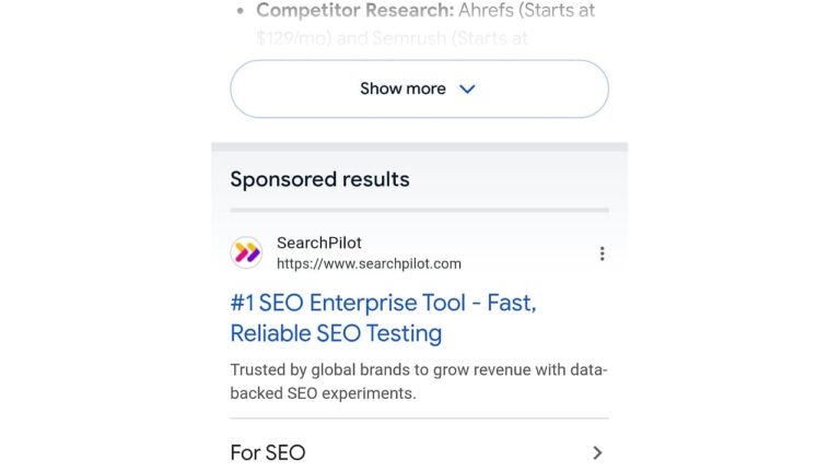 Screenshot of Google search results showing a sponsored result section with SearchPilot SEO tool ad featuring a light gray background and animated border
