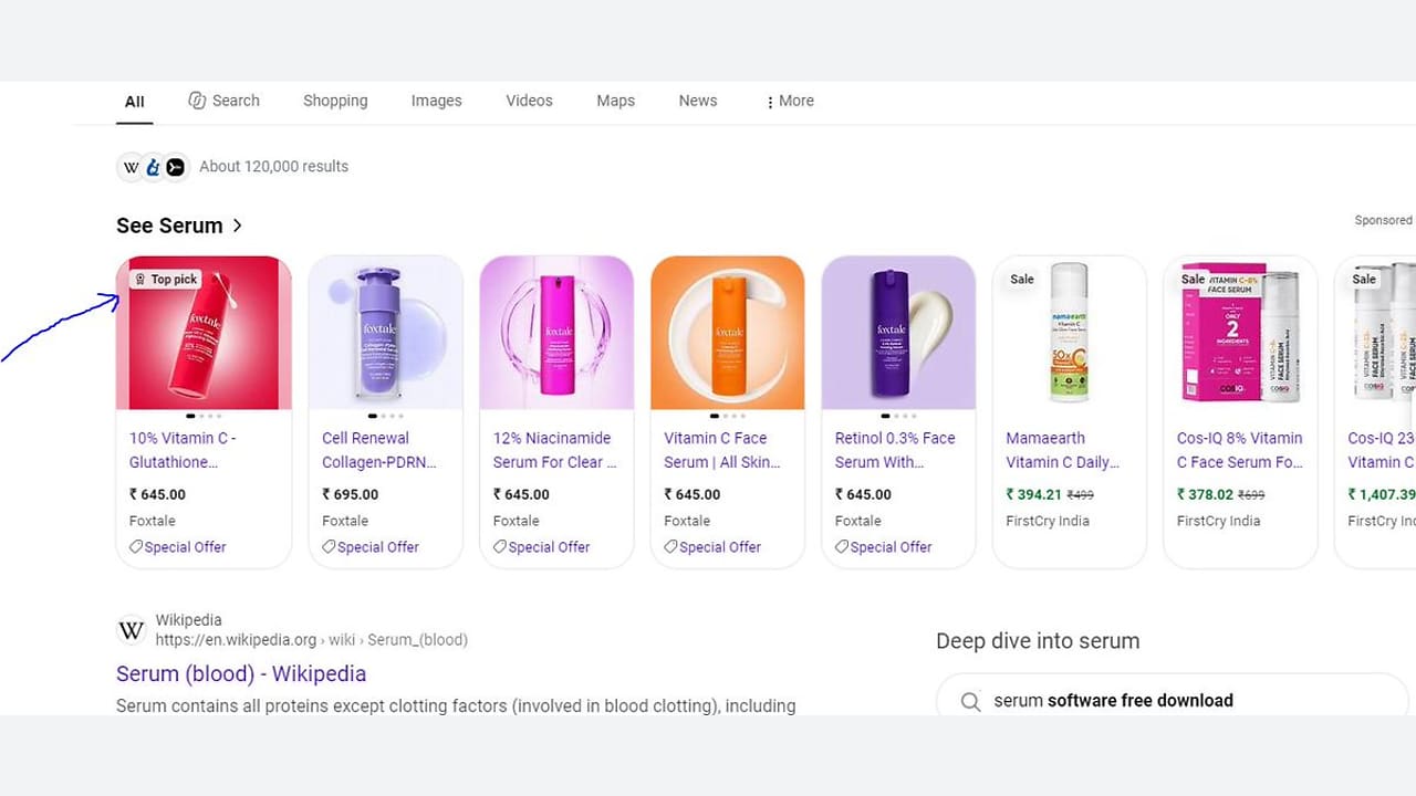 Screenshot of a Google search for “Serum” showing various serum products with prices. The first product, marked “Top pick,” is highlighted with a blue arrow. Wikipedia link is partially visible below.