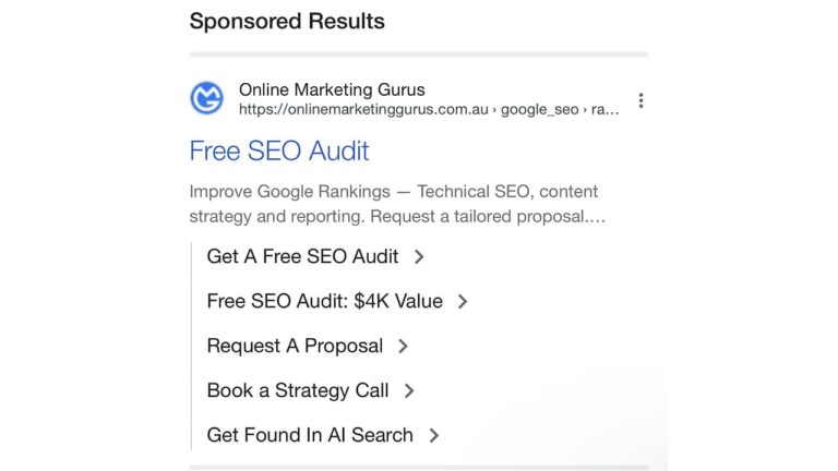 Screenshot of Google sponsored search result showing Online Marketing Gurus free SEO audit ad with multiple sitelink extensions including Get A Free SEO Audit, Free SEO Audit $4K Value, Request A Proposal, Book a Strategy Call, and Get Found In AI Search options.